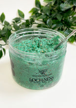Load image into Gallery viewer, loch ness body scrub, green textured product in clear jar