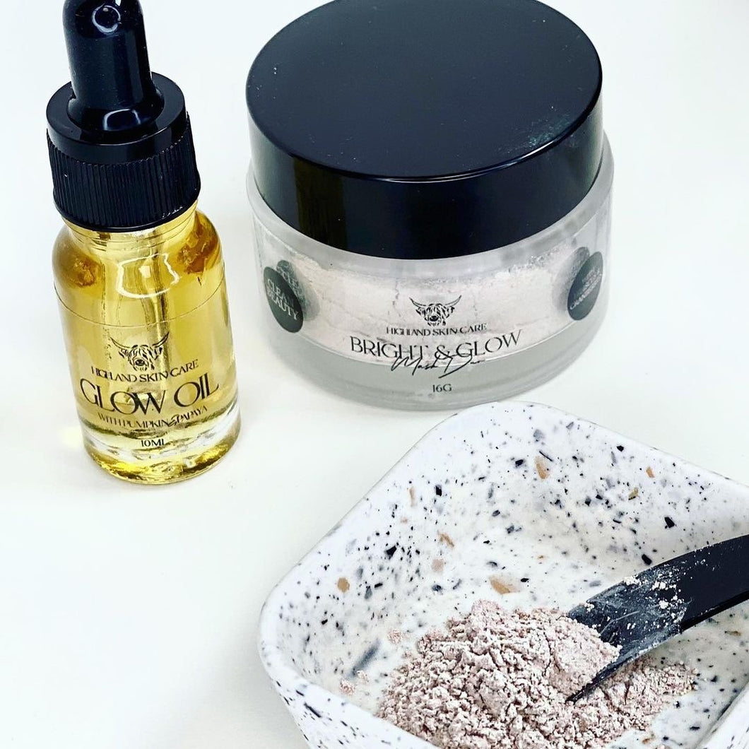 a bottle of oil, with our jar of bright powder